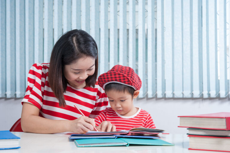 Why ABA Therapy Should Be Customised for Your Child’s Needs Mother working closely with her young son during a personalized ABA therapy session, highlighting the importance of customized autism support tailored to each child’s needs in Singapore.