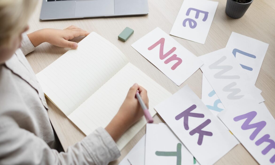 Child practicing writing with alphabet flashcards during a speech therapy session, highlighting benefits of speech therapy for children.