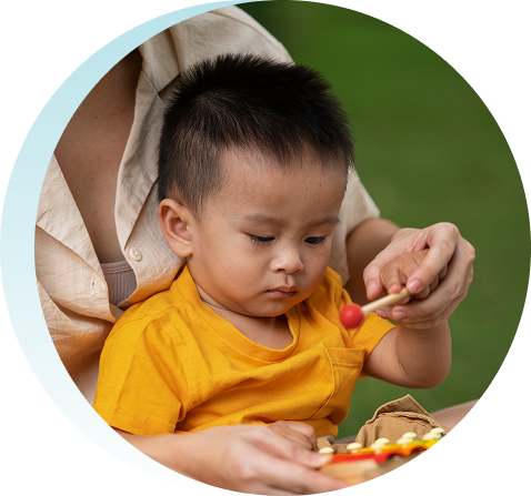 front view mother kid sitting grass
